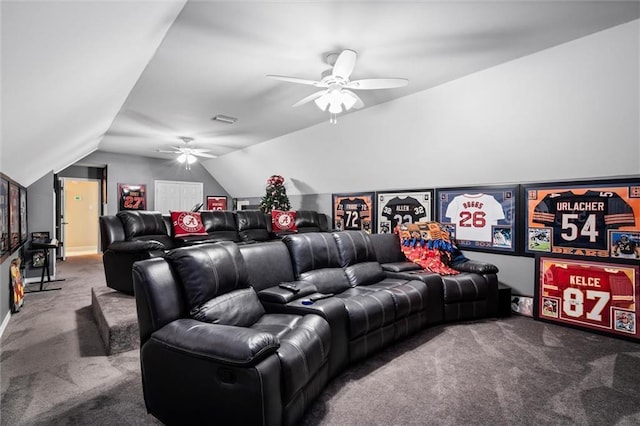 home theater room featuring lofted ceiling, carpet floors, and ceiling fan