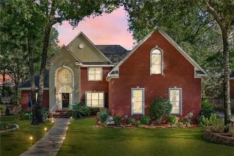 view of property with a lawn