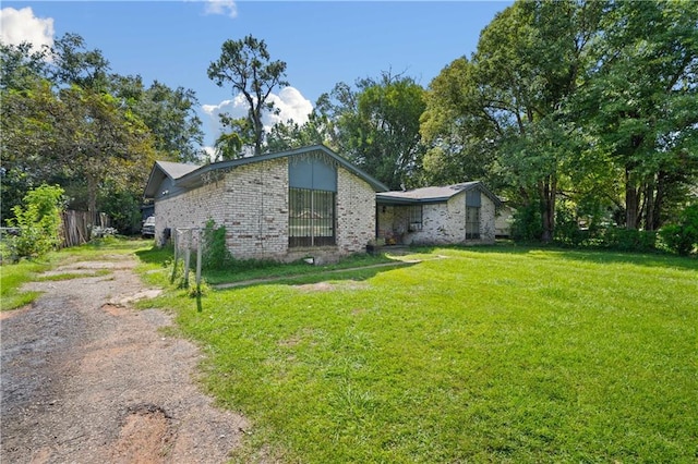 view of front of home with a front lawn