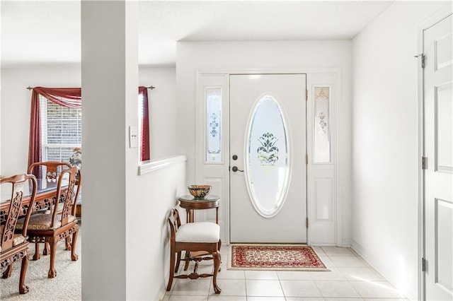 view of tiled foyer entrance