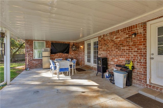 view of patio with outdoor dining area