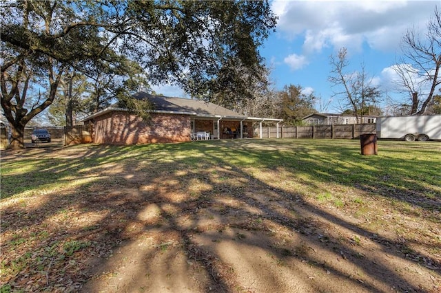 view of yard featuring fence