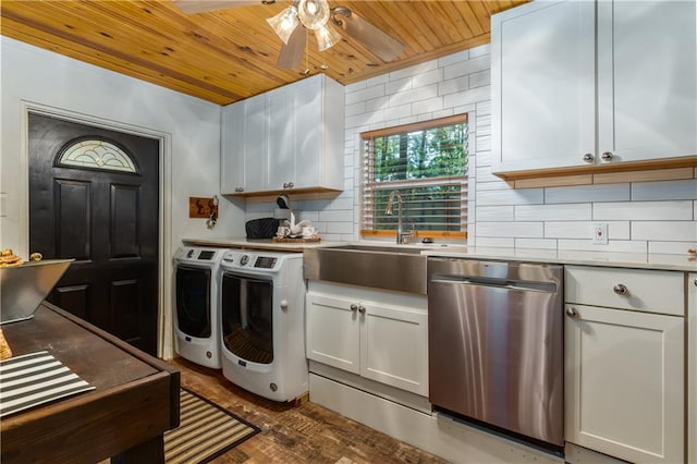 kitchen with washing machine and clothes dryer, backsplash, stainless steel dishwasher, wooden ceiling, and ceiling fan