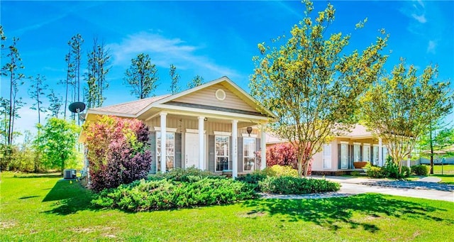 neoclassical home with a front lawn