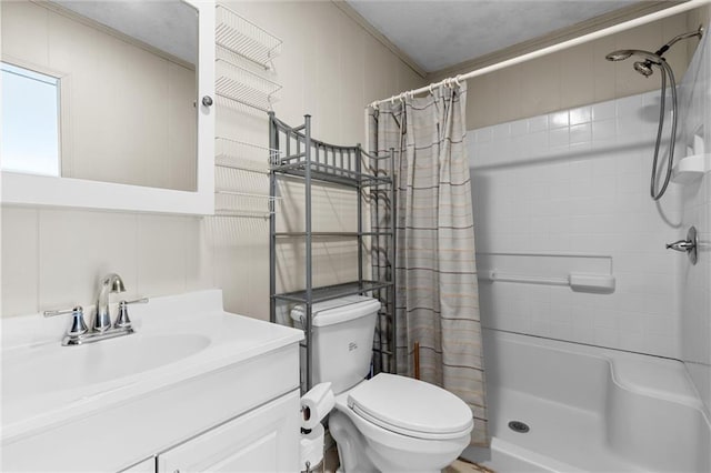 bathroom featuring curtained shower, toilet, vanity, tile walls, and ornamental molding