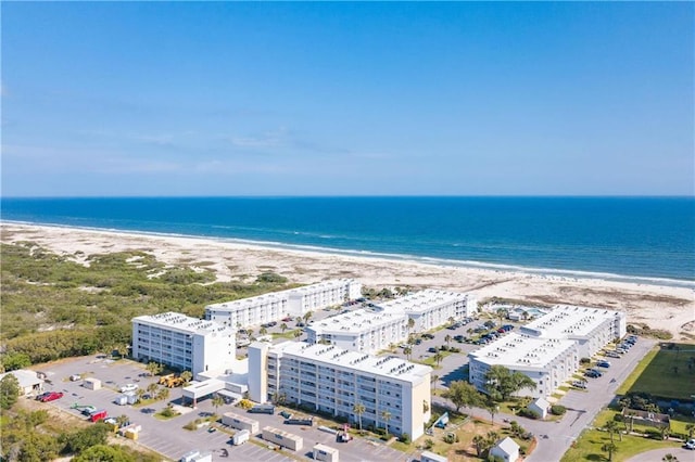 aerial view with a beach view and a water view