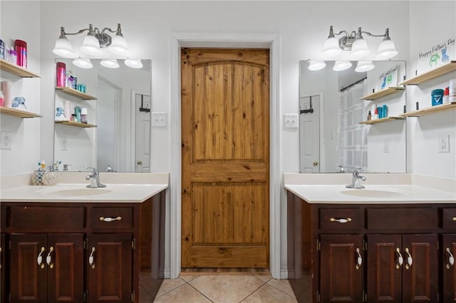 3420 Floyd Cir E, Semmes, AL 36575 - bathroom with tile patterned flooring and two vanities