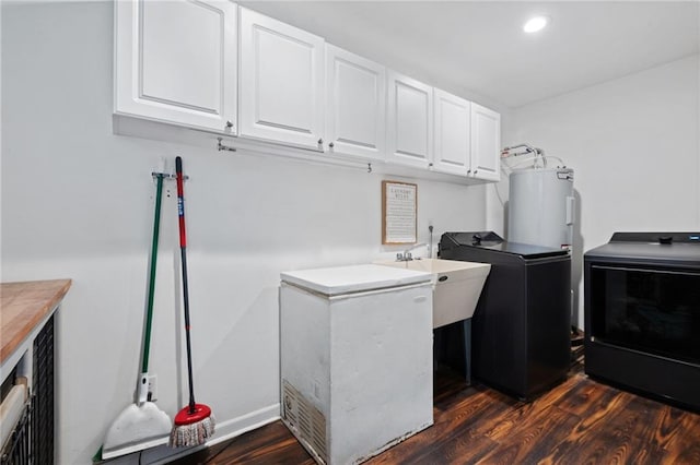 3420 Floyd Cir E, Semmes, AL 36575 - laundry area with cabinet space, dark wood-type flooring, washer and dryer, electric water heater, and recessed lighting