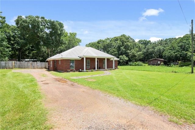 3420 Floyd Cir E, Semmes, AL 36575 - view of outbuilding with dirt driveway