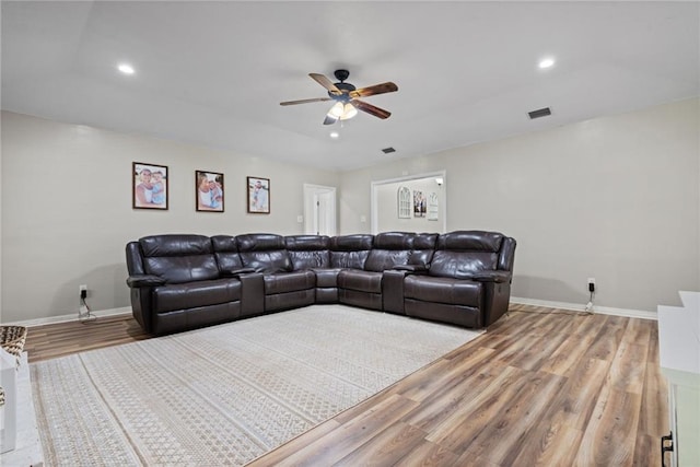 3420 Floyd Cir E, Semmes, AL 36575 - home theater featuring wood finished floors, ceiling fan, and recessed lighting