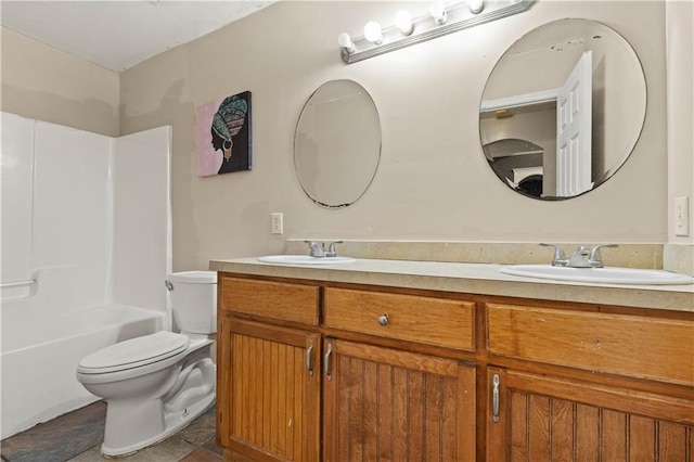 full bathroom with shower / tub combination, tile patterned floors, toilet, and double sink vanity