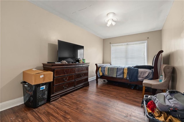 bedroom with hardwood / wood-style floors