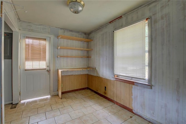 interior space featuring wooden walls