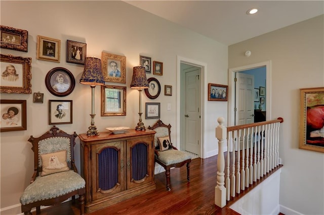 living area with dark wood-type flooring