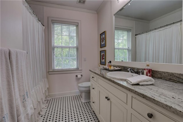 bathroom featuring oversized vanity, toilet, tile floors, and crown molding