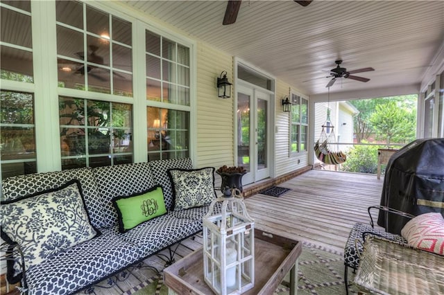 exterior space featuring ceiling fan