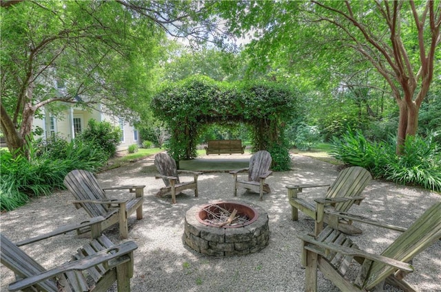 view of patio featuring an outdoor fire pit