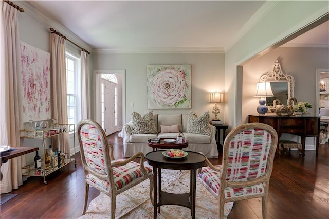 living room featuring ornamental molding and hardwood / wood-style flooring