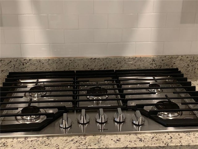 details featuring stainless steel gas cooktop