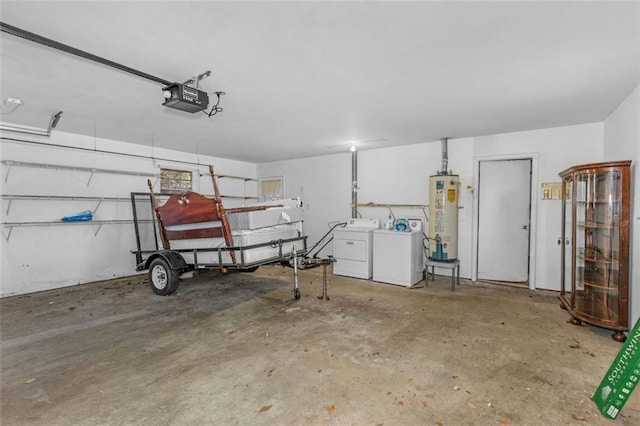 garage with water heater, a garage door opener, and washer and dryer