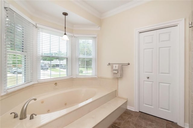 1509 Ridgeland Rd E, Mobile, AL 36695 - bathroom featuring a tub with jets and ornamental molding