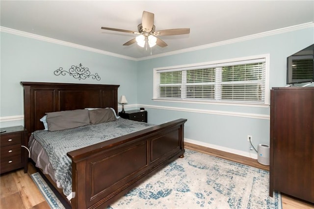 1509 Ridgeland Rd E, Mobile, AL 36695 - bedroom featuring light wood-type flooring, crown molding, and ceiling fan