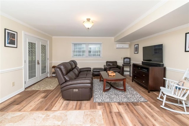 1509 Ridgeland Rd E, Mobile, AL 36695 - living room featuring a wall unit AC, wood finished floors, ornamental molding, and french doors