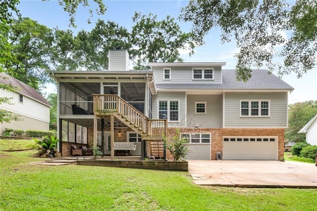 1509 Ridgeland Rd E, Mobile, AL 36695 - back of house with a sunroom, stairs, brick siding, a garage, and a chimney
