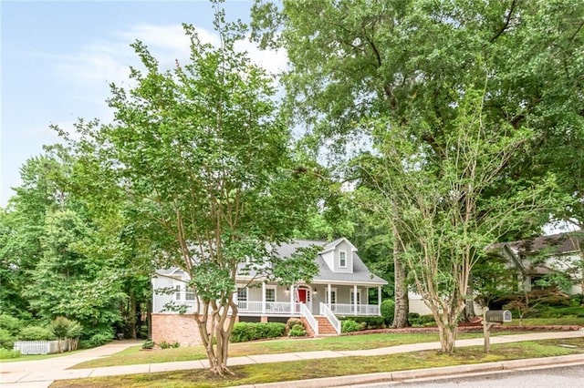 1509 Ridgeland Rd E, Mobile, AL 36695 - view of front facade with covered porch and concrete driveway