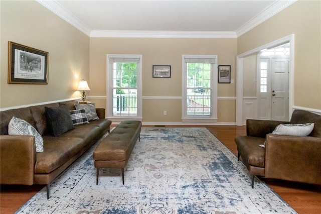 1509 Ridgeland Rd E, Mobile, AL 36695 - living area with ornamental molding, healthy amount of natural light, and wood finished floors