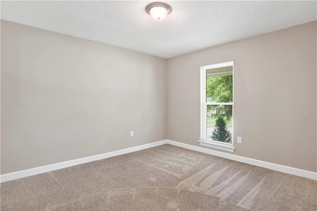 1115 Newbury Ln W, Mobile, AL 36695 - carpeted empty room with a textured ceiling and baseboards