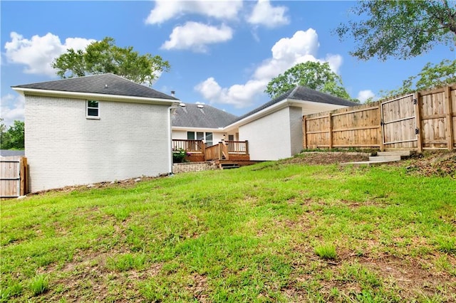 1115 Newbury Ln W, Mobile, AL 36695 - fenced backyard with a wooden deck