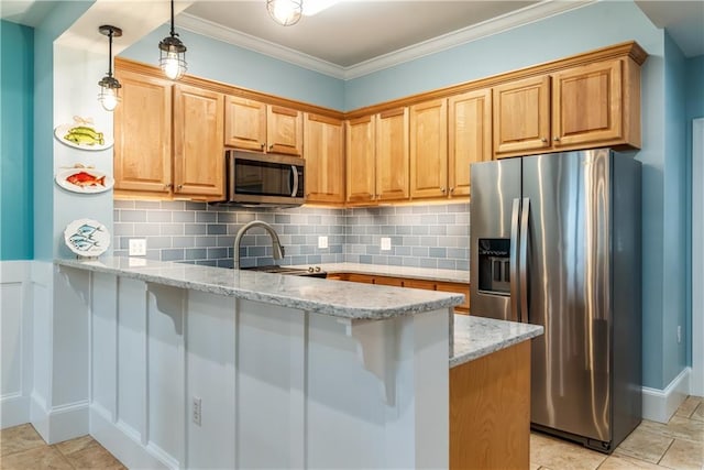 kitchen with stainless steel appliances, light stone counters, a peninsula, and tasteful backsplash