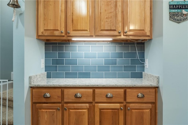 interior space featuring tasteful backsplash