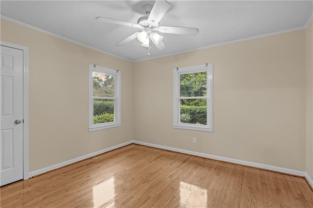 unfurnished room with crown molding, ceiling fan, and light hardwood / wood-style flooring