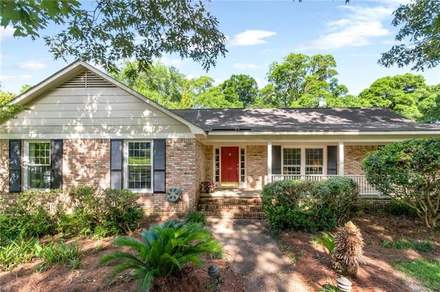 258 Suffolk Rd, Mobile, AL 36608 - ranch-style home featuring a porch and brick siding