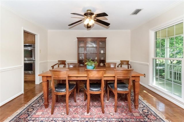 258 Suffolk Rd, Mobile, AL 36608 - dining area with ornamental molding, ceiling fan, and baseboards