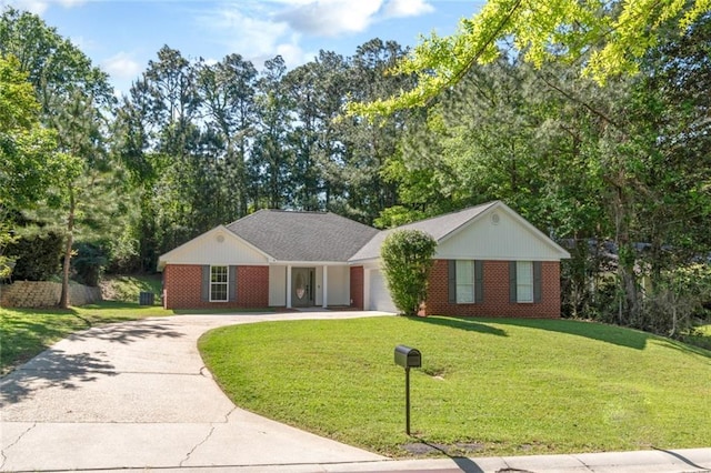 192 Bay View Dr, Daphne, AL 36526 - ranch-style home featuring driveway, a front yard, a garage, and brick siding