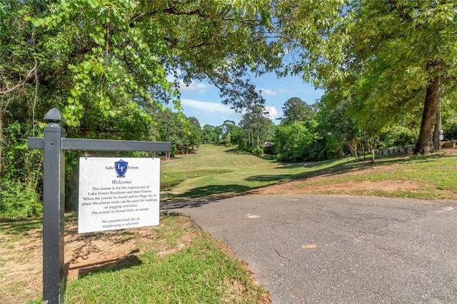 192 Bay View Dr, Daphne, AL 36526 - surrounding community with view of wooded area and a yard