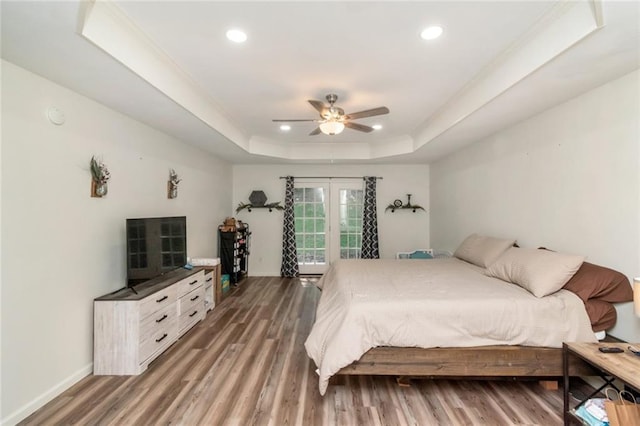 192 Bay View Dr, Daphne, AL 36526 - bedroom with a raised ceiling, wood finished floors, recessed lighting, crown molding, and ceiling fan