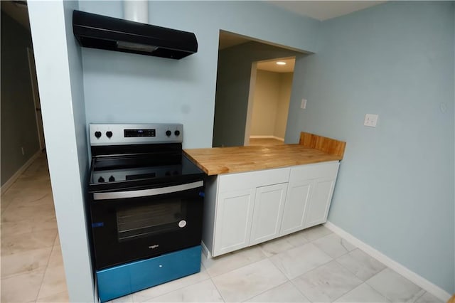 kitchen featuring ventilation hood, baseboards, wood counters, electric range oven, and white cabinetry