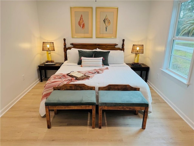 bedroom featuring light wood-type flooring