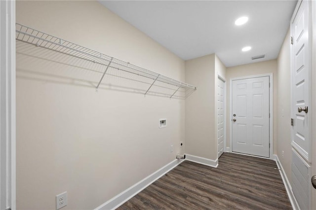 washroom featuring hookup for a washing machine, dark wood-type flooring, and hookup for an electric dryer