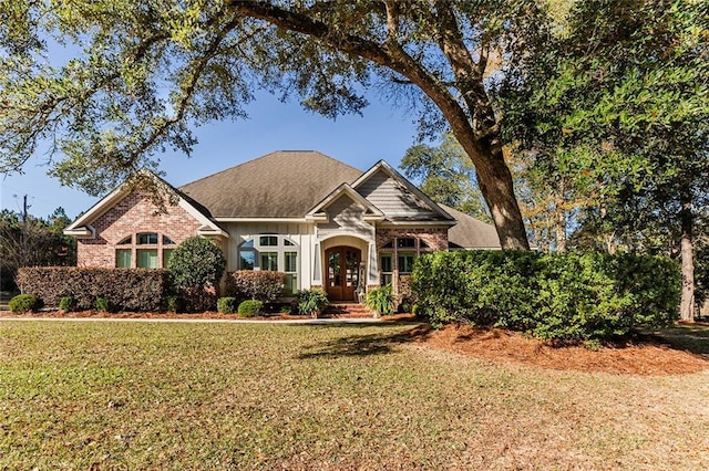 view of front of house with a front lawn