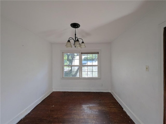 1151 Navco Rd, Mobile, AL 36605 - unfurnished dining area with a chandelier, hardwood / wood-style flooring, and baseboards