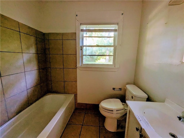 1151 Navco Rd, Mobile, AL 36605 - bathroom featuring toilet, a tub to relax in, tile patterned floors, vanity, and a shower
