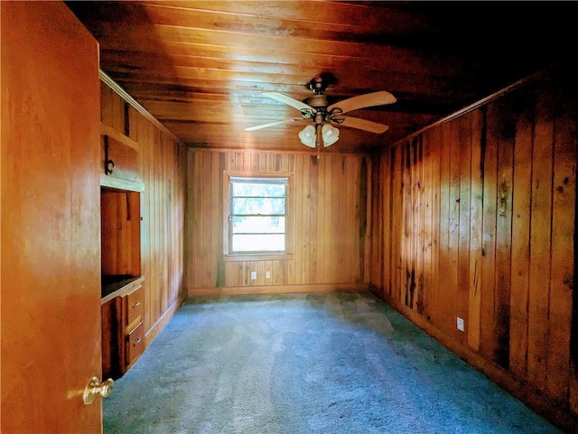 1151 Navco Rd, Mobile, AL 36605 - spare room with wood ceiling, carpet flooring, ceiling fan, wood walls, and baseboards