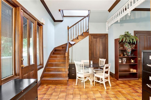 dining space featuring ornamental molding