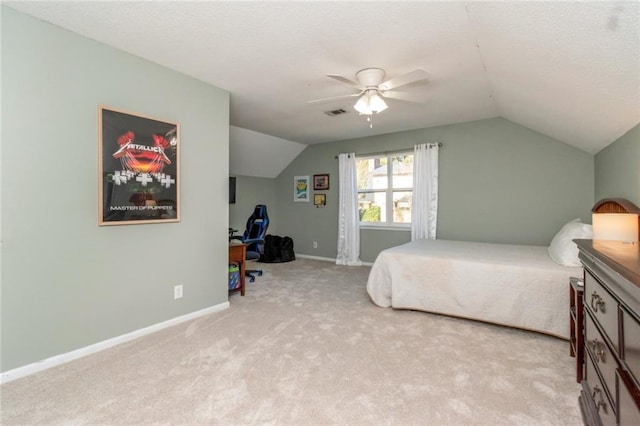 bedroom with ceiling fan, light carpet, and lofted ceiling