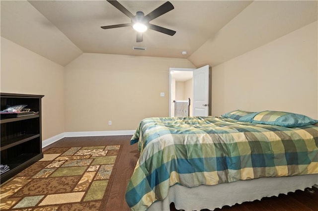 bedroom with lofted ceiling, baseboards, visible vents, and ceiling fan